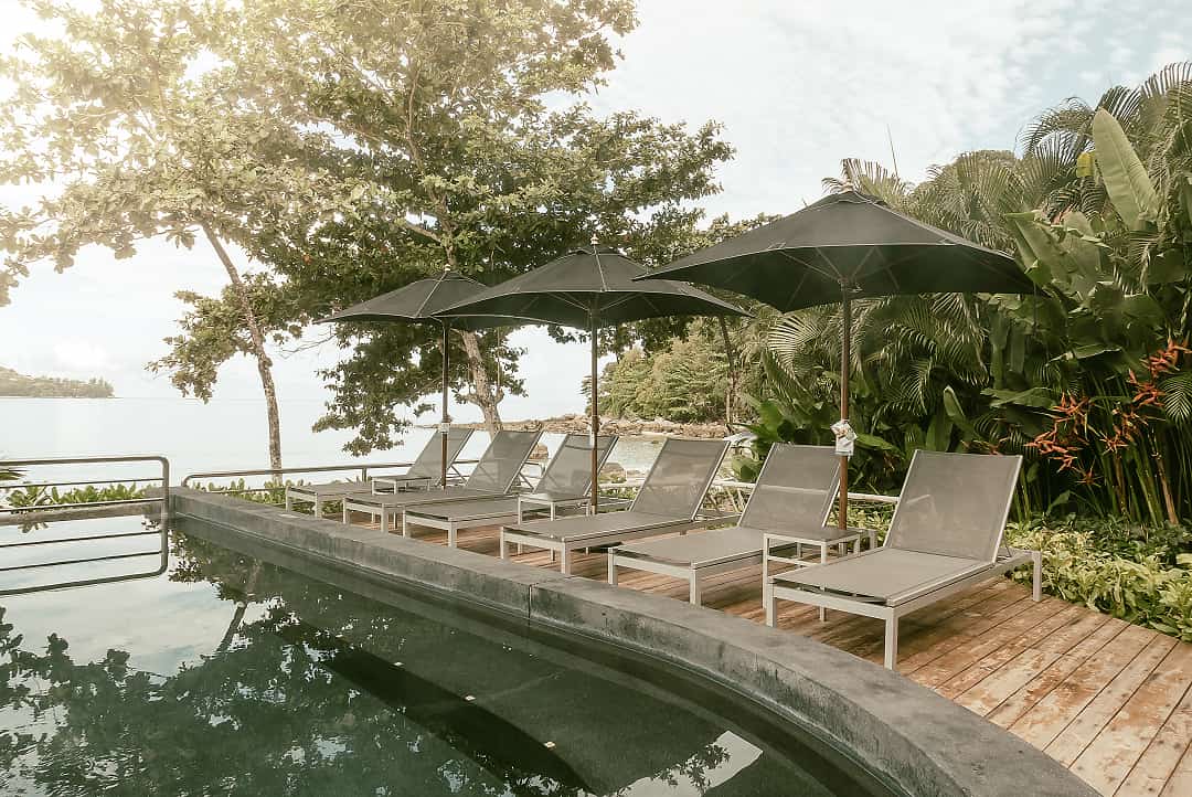 sun-loungers-with-parasol-close-pool 1 (1)